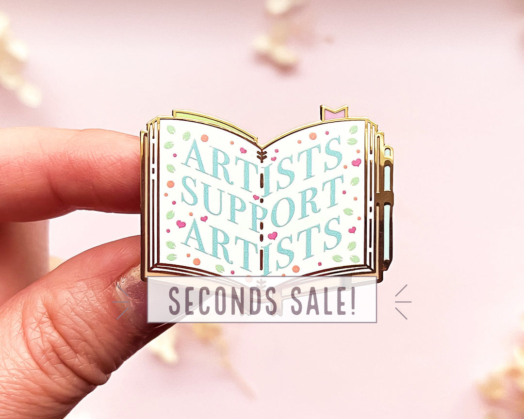 Artists Support Artists Sketchbook Enamel Pin (Seconds)