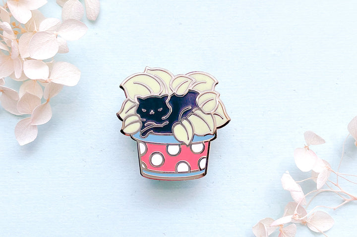 Cat Lying on Plant Enamel Pin