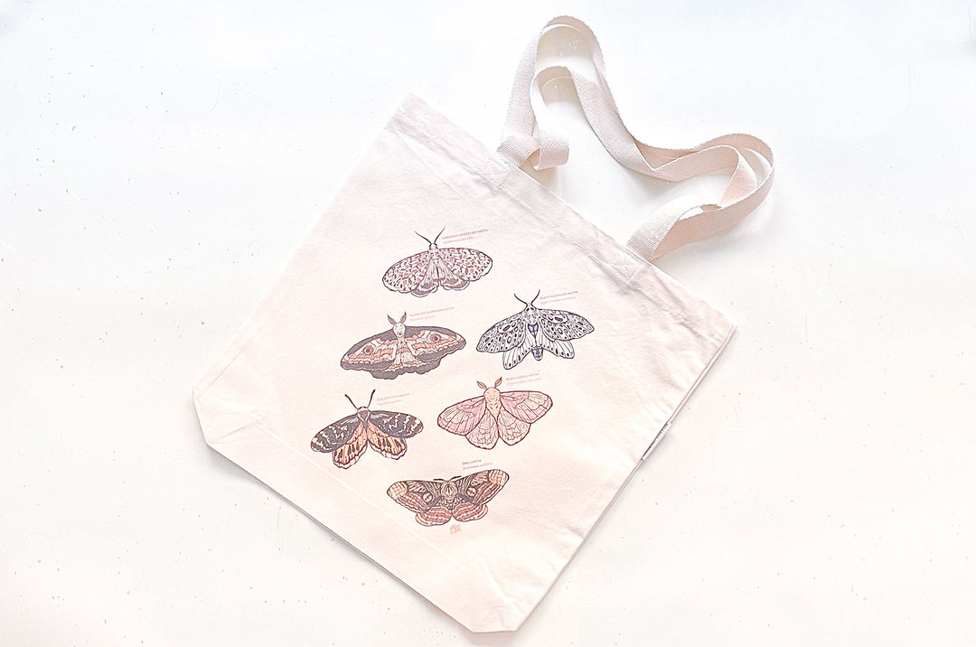 An Eclipse of Moths Tote Bag