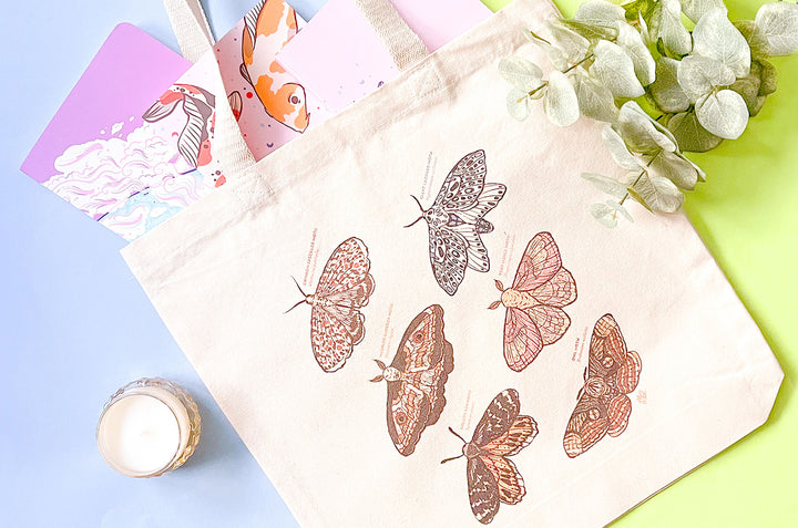 An Eclipse of Moths Tote Bag