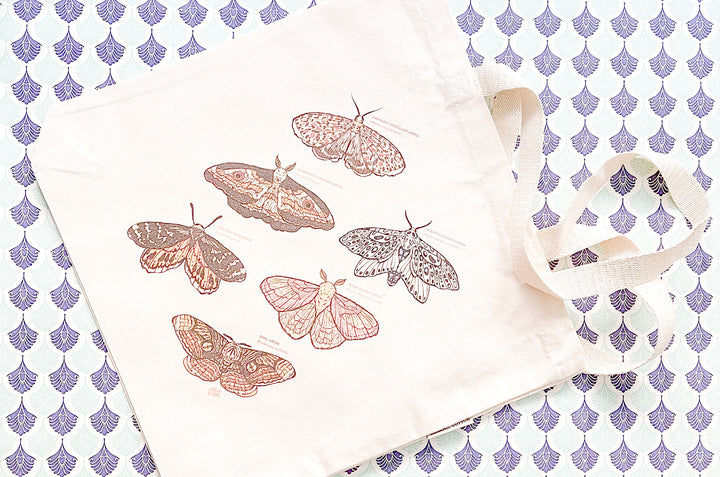 An Eclipse of Moths Tote Bag