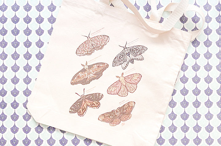 An Eclipse of Moths Tote Bag