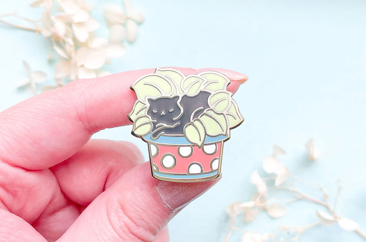 Cat Lying on Plant Enamel Pin