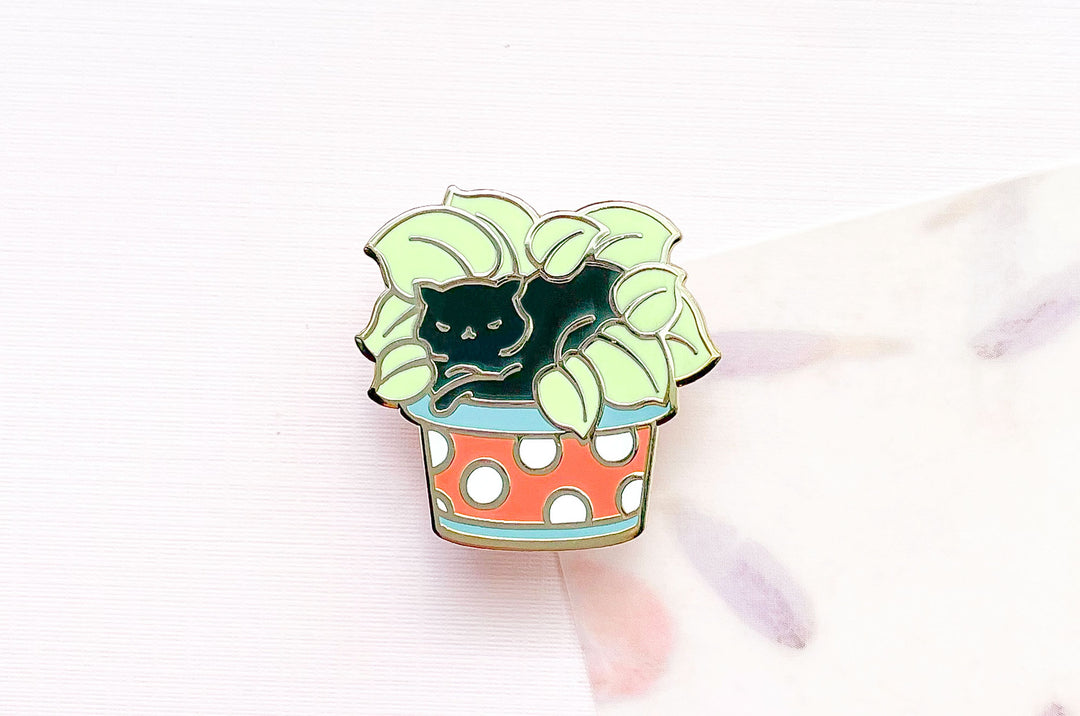 Cat Lying on Plant Enamel Pin