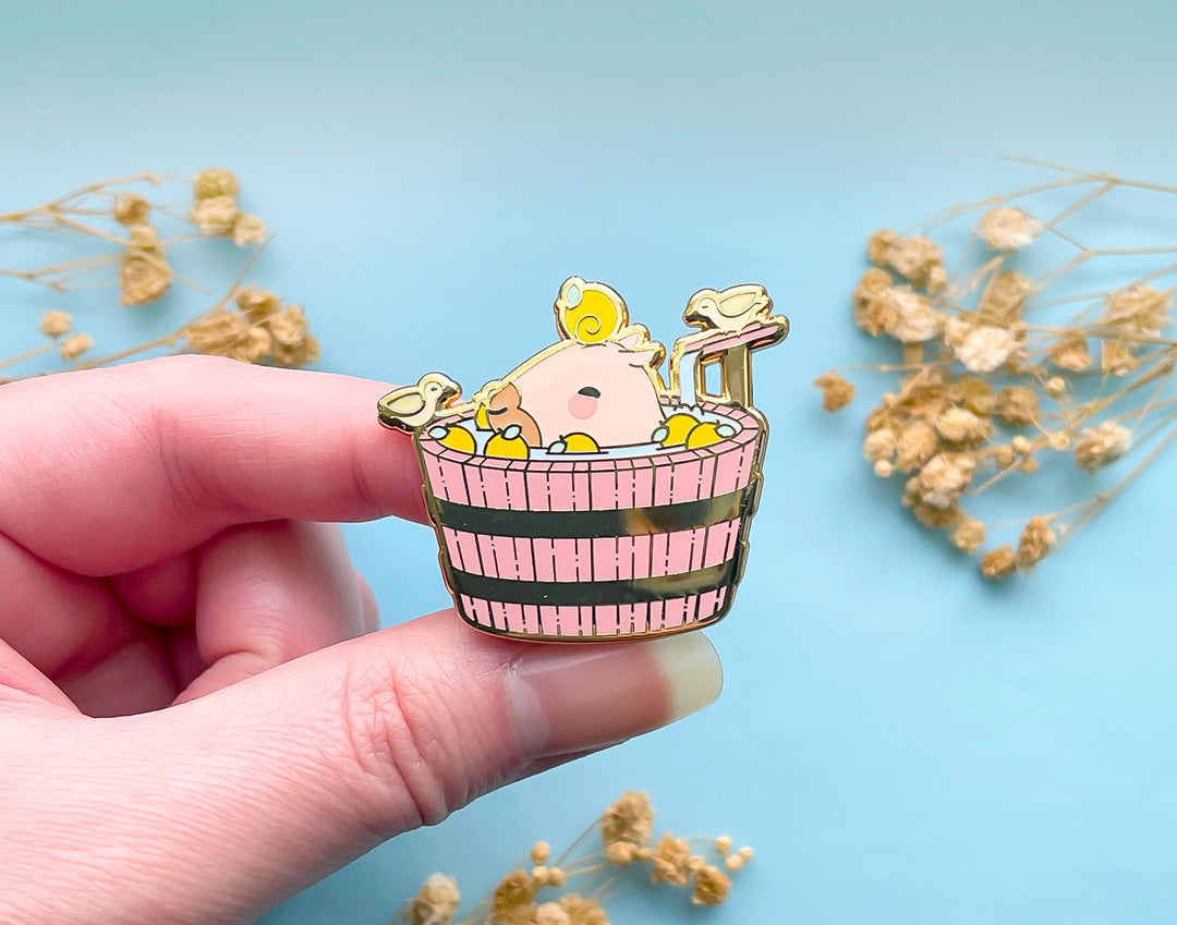 Curly the Capybara in a Bucket Spa Enamel Pin