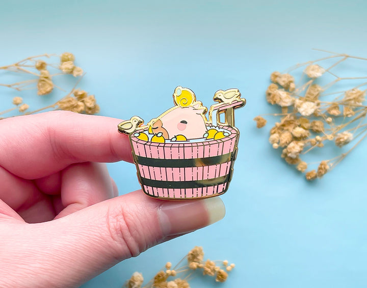 Curly the Capybara in a Bucket Spa Enamel Pin