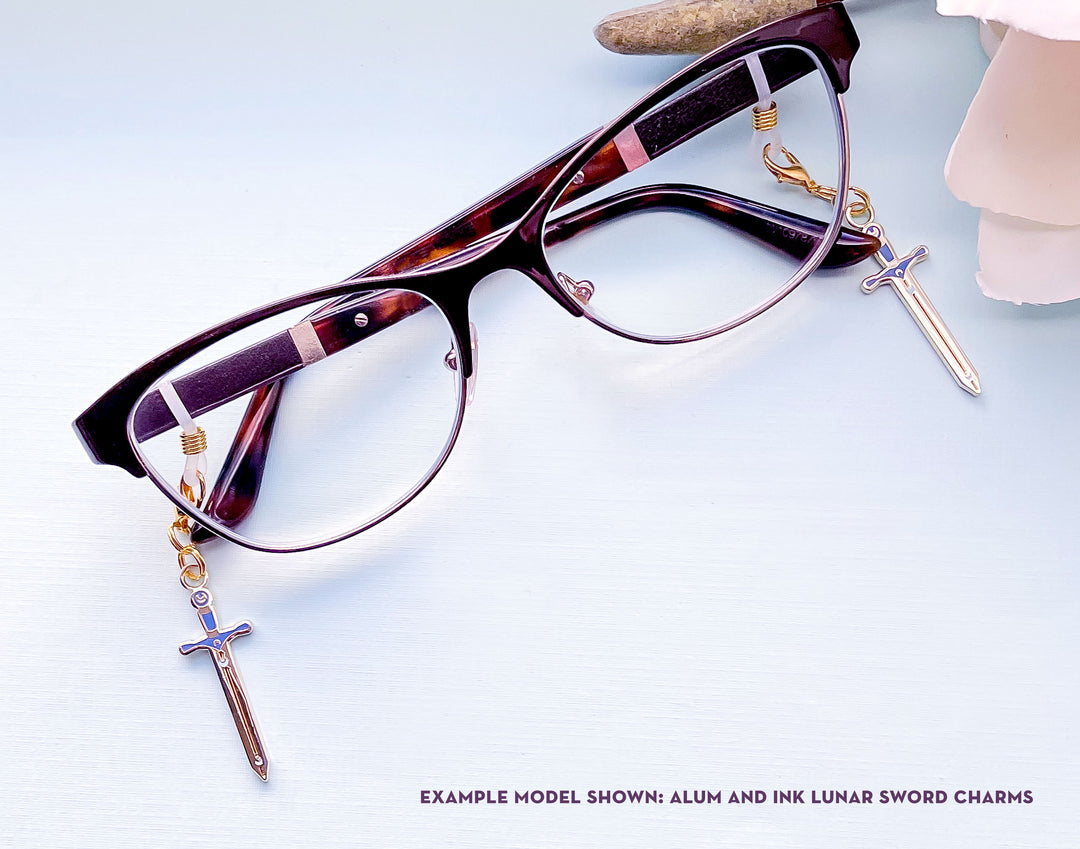 Lunar Sword Enamel and Metal Glasses Charm
