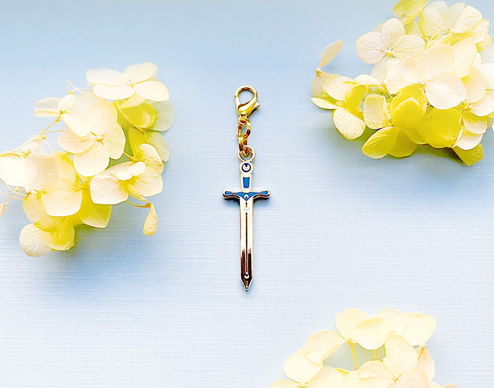 Lunar Sword Enamel and Metal Glasses Charm