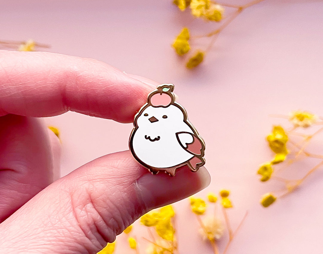 Kiki the Persimmon Shima Enaga Enamel Pin
